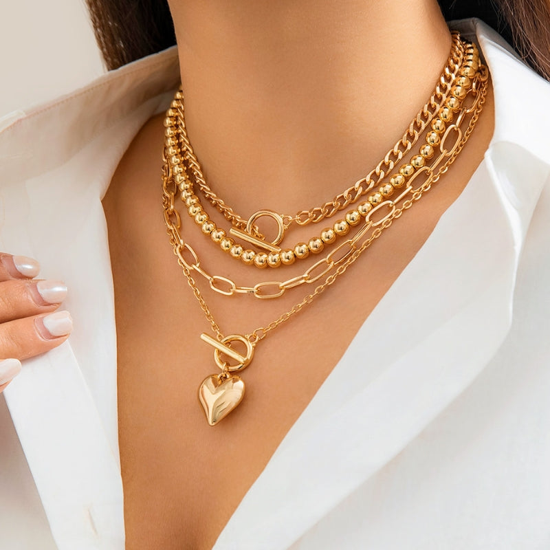 Collier Multicouches Solane Avec Perles Et Chaînes Audacieuses Design Sculpté Pour Décolleté Élégant