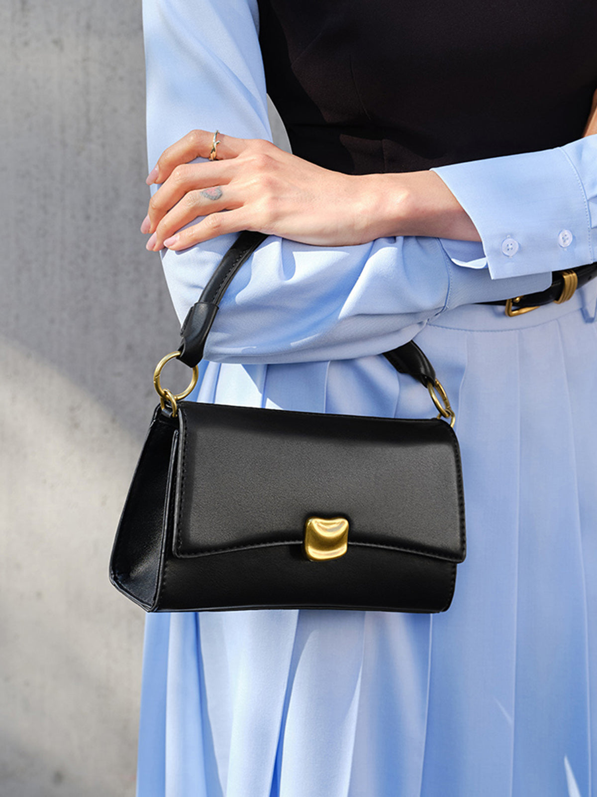 Damen Handtasche im Old-Money-Stil, schwarz
- Krohn-e