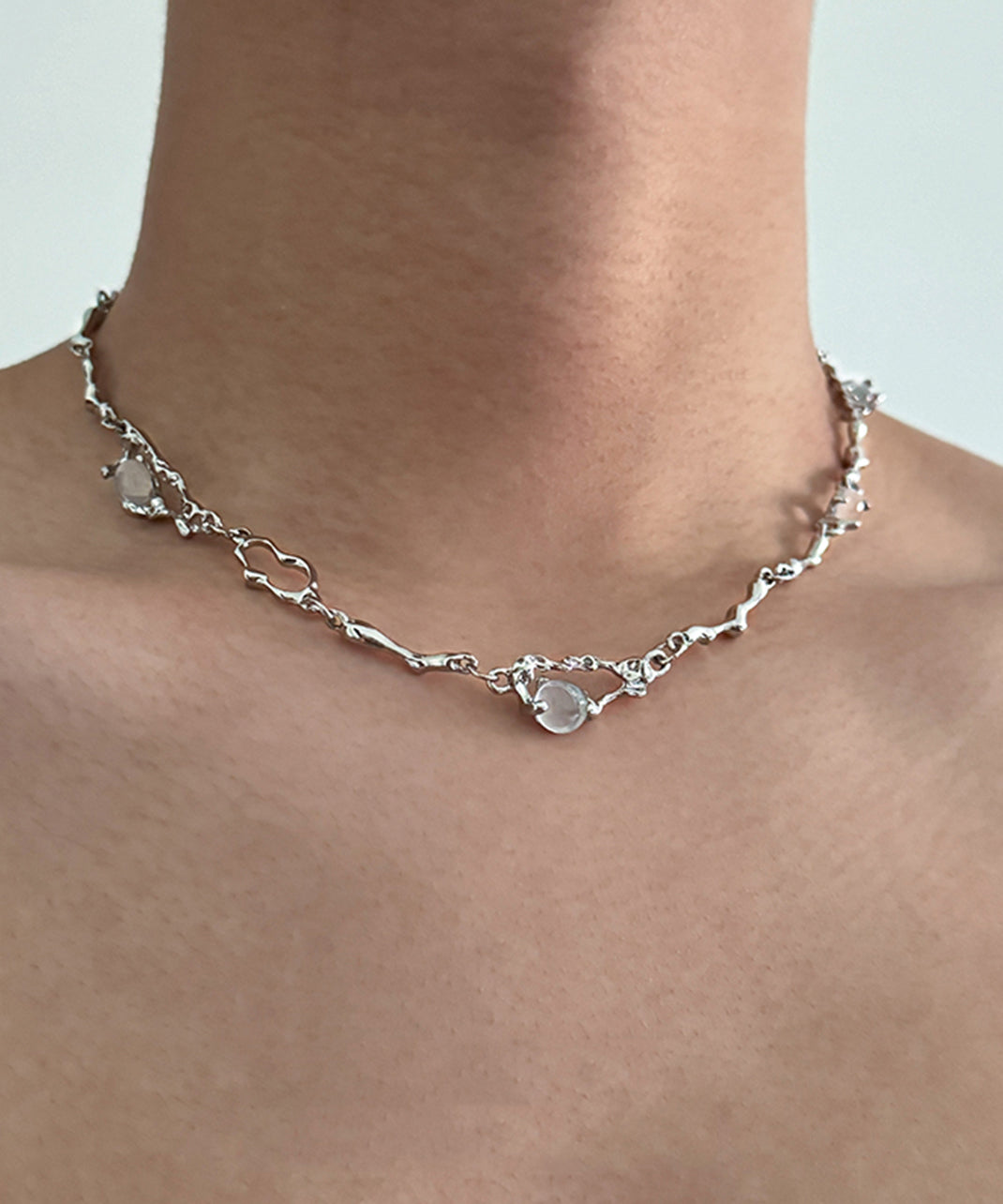 Collier avec pendentif asymétrique en acier inoxydable et pierre œil de chat Boutique Silk - Amawinc