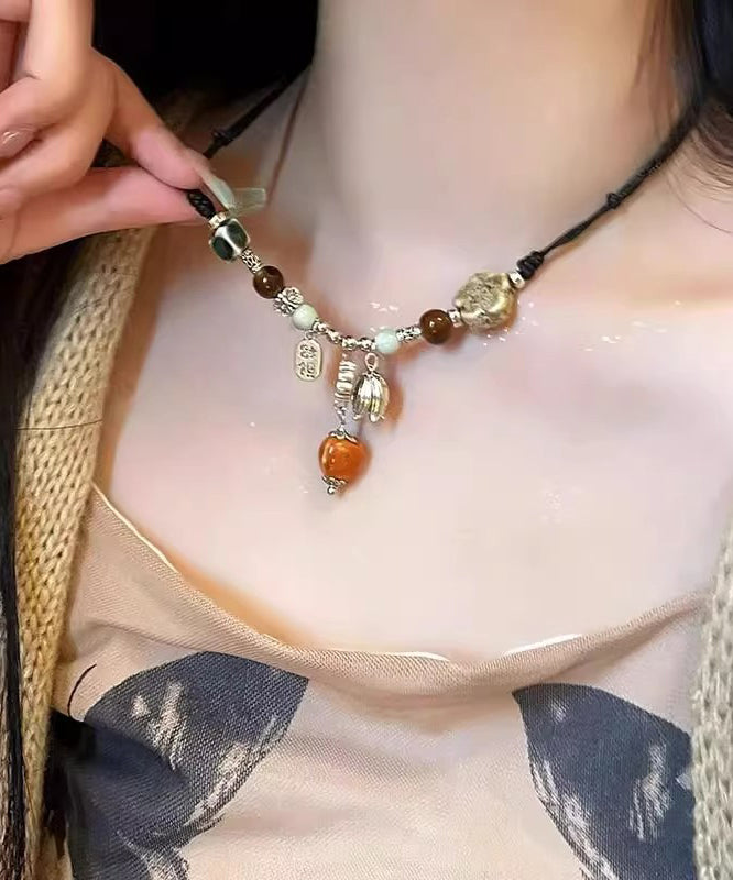 Collier pendentif en perles de céramique en alliage tissé noir fait à la main - Amawinc