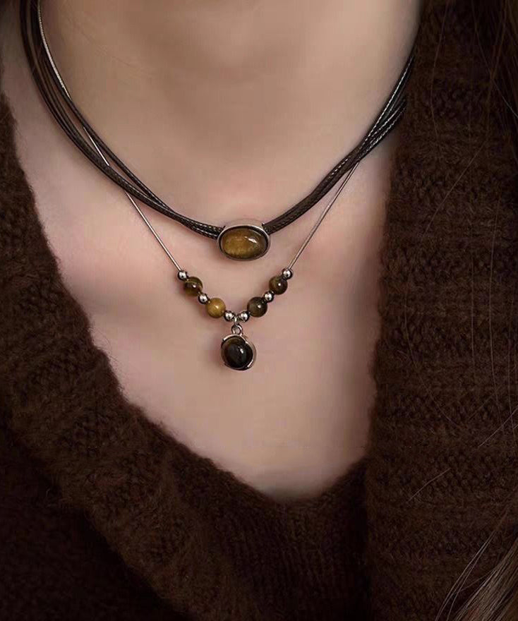 Ensemble de deux colliers pendentifs œil de tigre en patchwork de cuir neuf - Amawinc