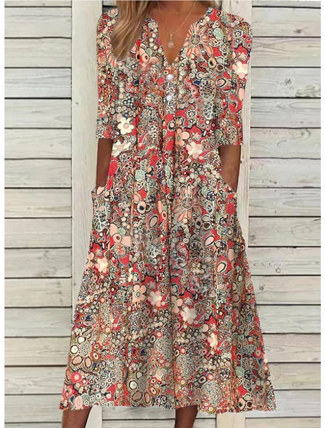 Damen-Midikleid mit Blumenmuster und aufgesetzten Taschen