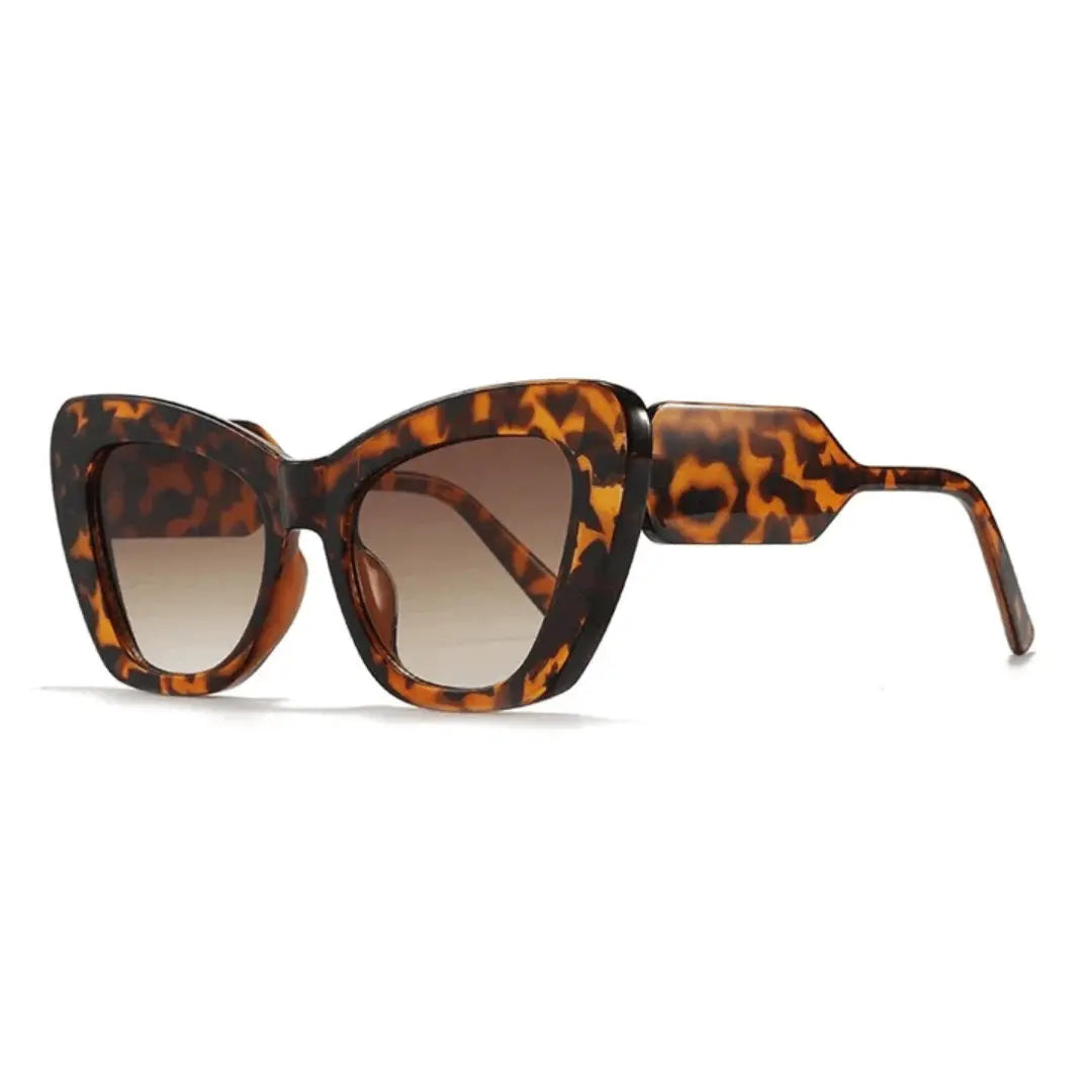 Lunettes de Soleil Œil de Chat Rétro Raffinées Avec Motifs Audacieux sur les Branches Modernes