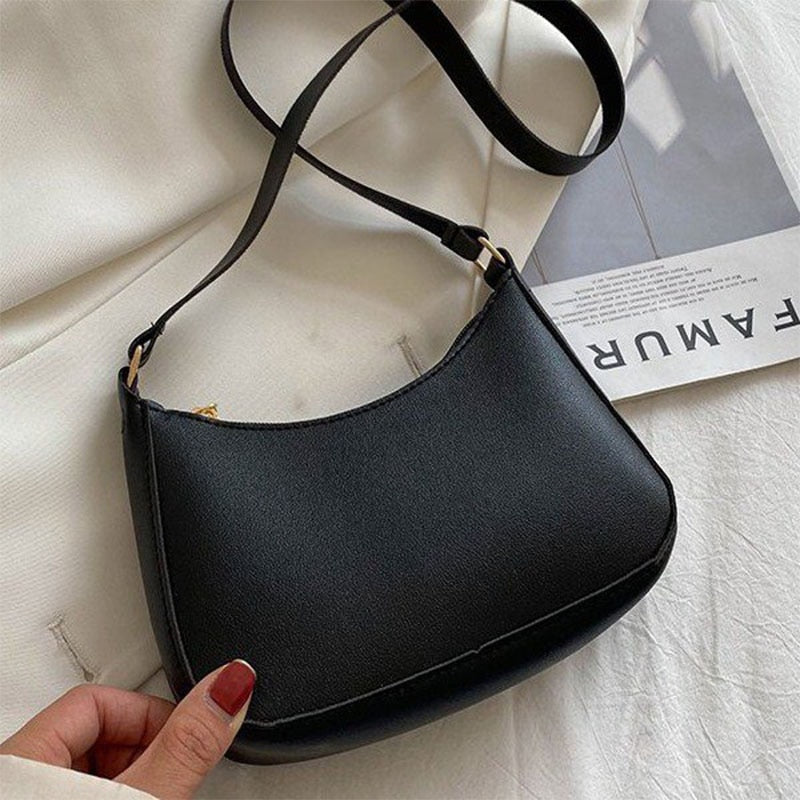 Keilira: Elegante Handtasche im Vintage-Stil