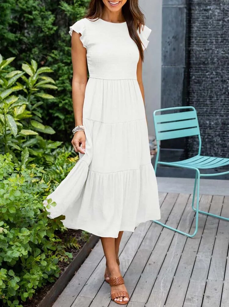 Sommerkleid Vesna: Elegant mit Rüschen und Taschen