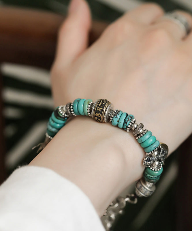 Bracelet à breloques vintage en argent sterling et soie avec perles turquoise - Amawinc