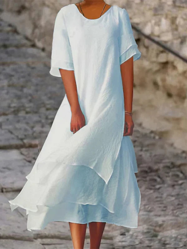 Ava Kleid: Elegantes Blockstreifen-Schlitzkleid