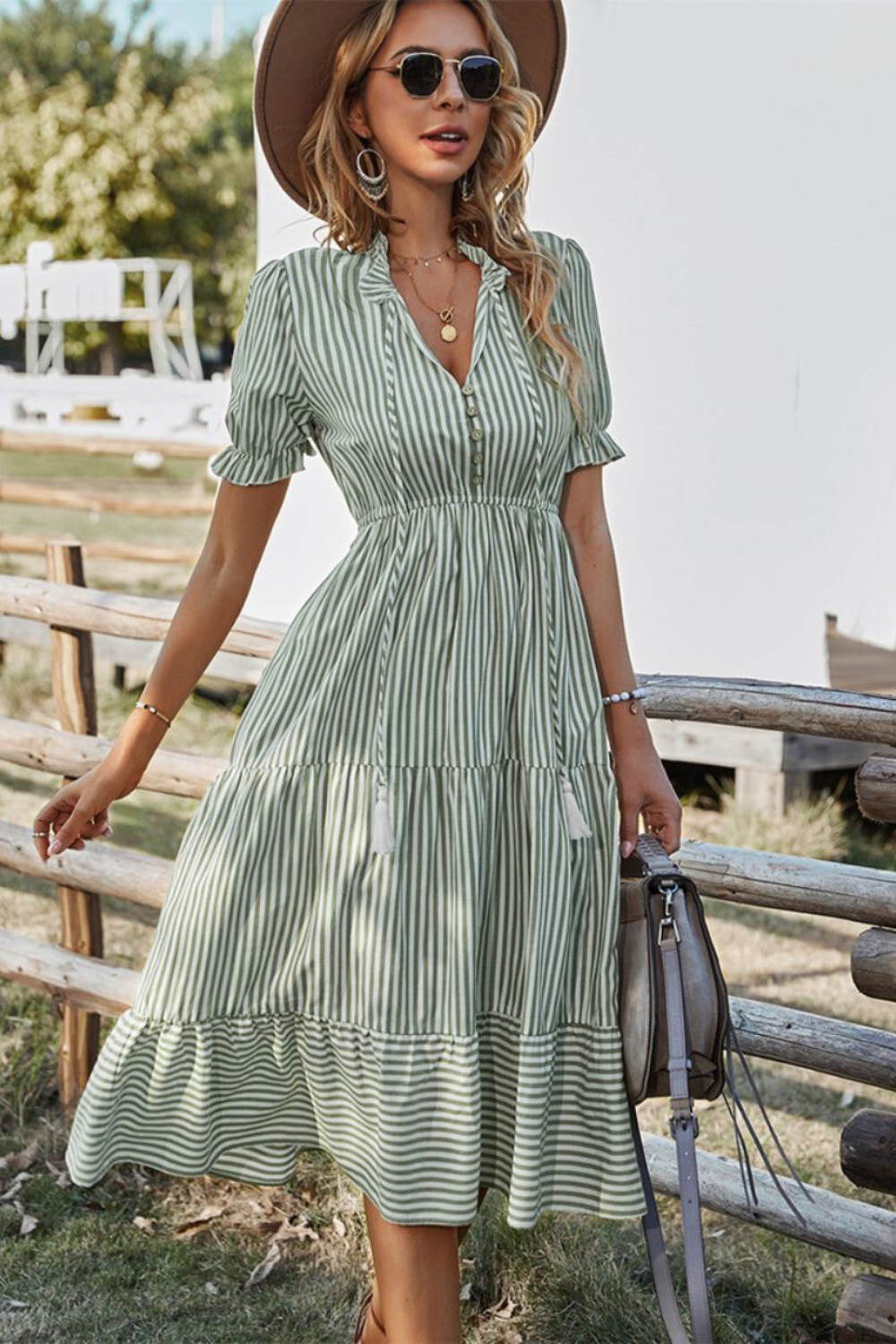 Damen-Midikleid mit Knöpfen und Quasten