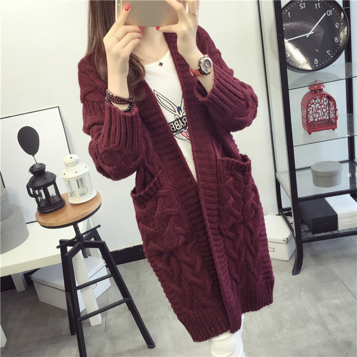 Damen Grobstrickjacke mit elegantem Zopfmuster und praktischen Taschen Amawinc