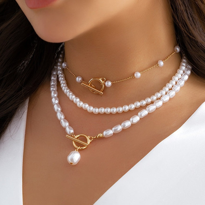 Collier Multicouches Solane Avec Perles Et Chaînes Audacieuses Design Sculpté Pour Décolleté Élégant