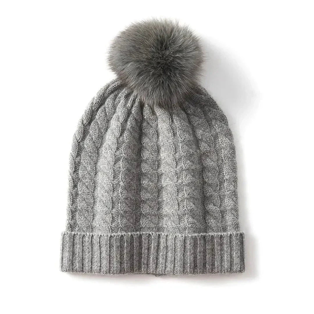 Bonnet En Cachemire À Torsades Avec Pompon En Fourrure Et Bord Côtelé Plié Pour Femme