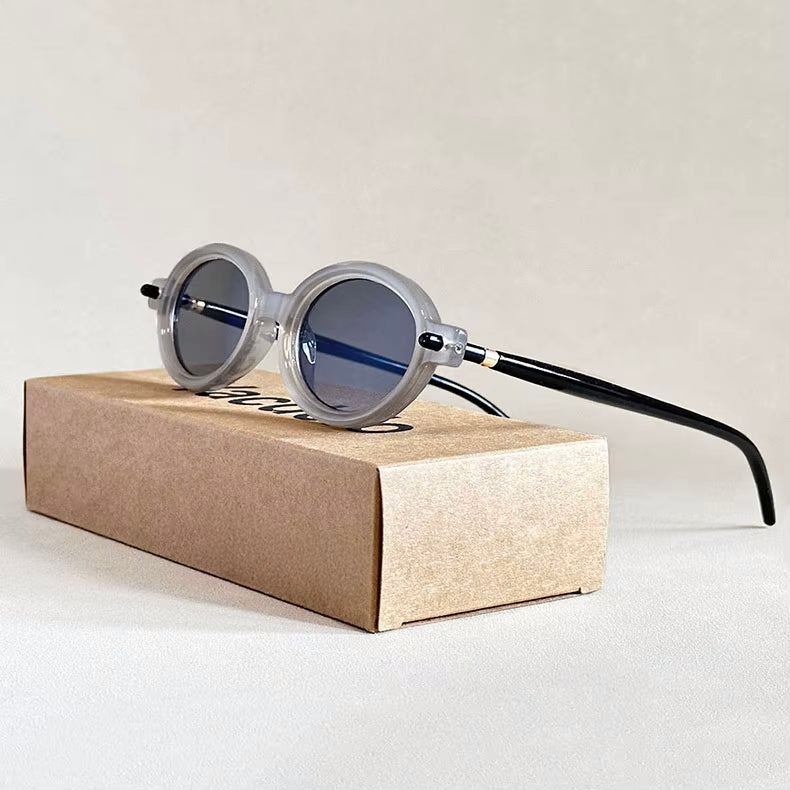 Lunettes De Soleil Ovales Rétro Aurelia Avec Charnières Épurées Et Détails Métalliques Subtils