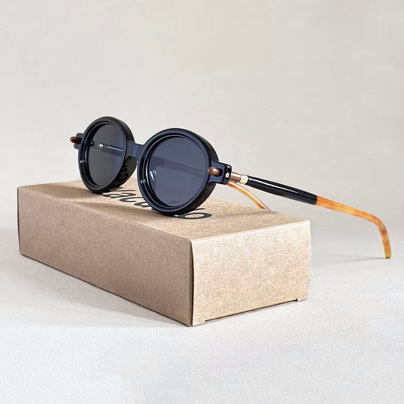 Lunettes De Soleil Ovales Rétro Aurelia Avec Charnières Épurées Et Détails Métalliques Subtils
