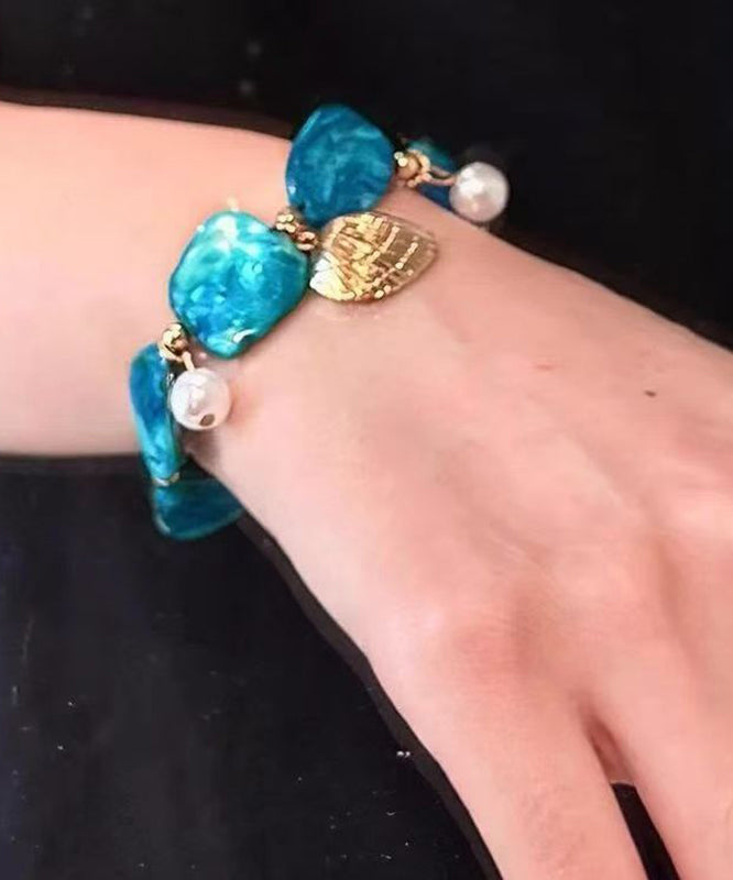 Bracelet à breloques asymétriques en alliage bleu bohème avec coquillages pour les fêtes - Amawinc