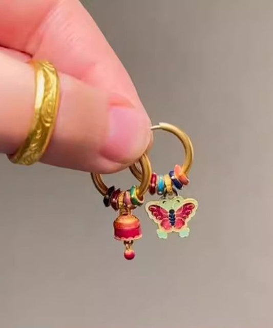 Boucles d'oreilles pendantes asymétriques en forme de cloche papillon en or antique chic - Amawinc