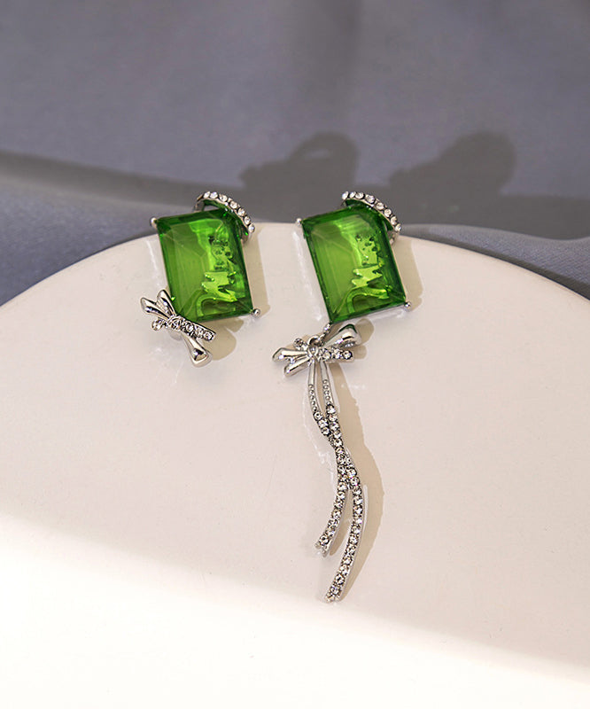 Boucles d'oreilles pendantes chics asymétriques en cuivre vert et zircon, avec nœud papillon et pompon - Amawinc