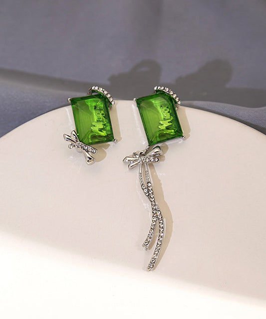Boucles d'oreilles pendantes chics asymétriques en cuivre vert et zircon, avec nœud papillon et pompon - Amawinc