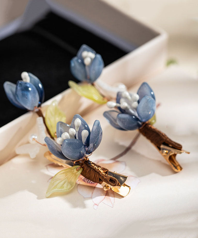 Paire d'épingles à cheveux lotus en cuivre bleu doré de style chinois, à glaçure nacrée. - Amawinc