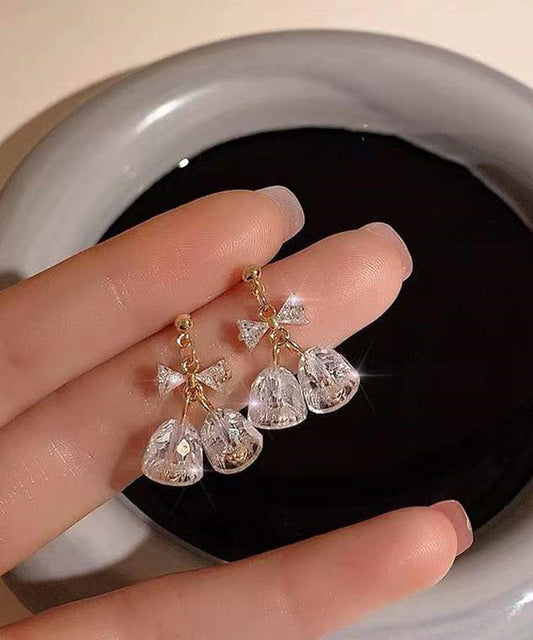 Boucles d'oreilles pendantes en zircon doré et cuivré, style tendance, avec nœud et clochette. - Amawinc