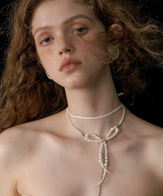 Collier à double pendentif en alliage blanc avec nœud en perles et pompon - Amawinc