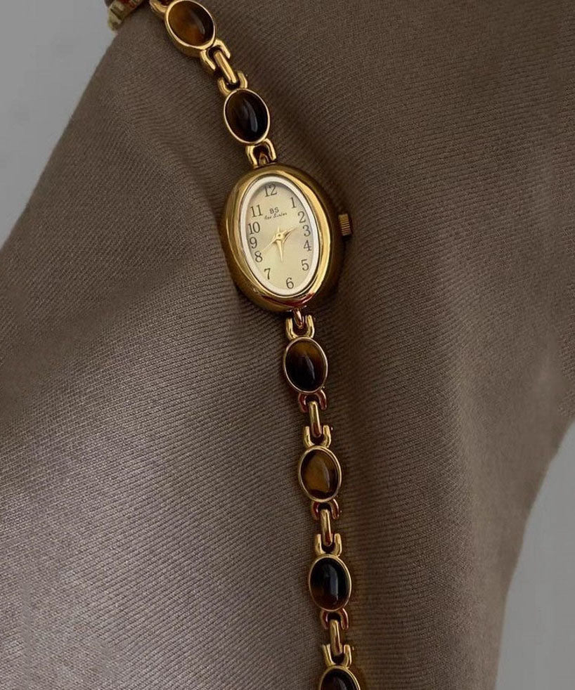 Montres à mouvement à quartz en verre trempé et alliage métallique doré fin - Amawinc