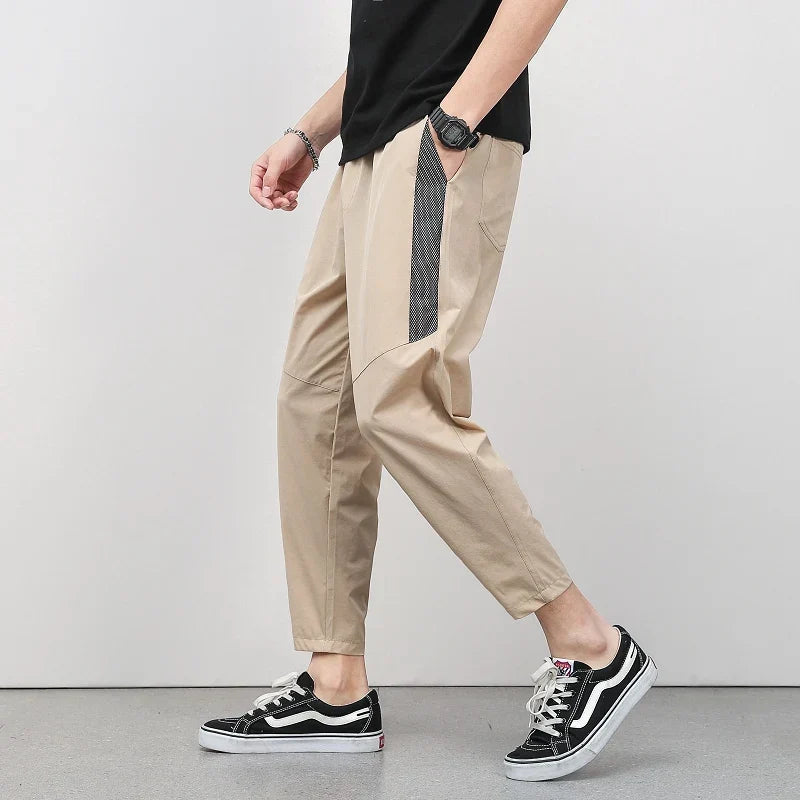 Pantalon Décontracté À Coupe Courte En Soie Glacée Avec Bande Latérale Et Jambe Fuselée Pour Style Polyvalent