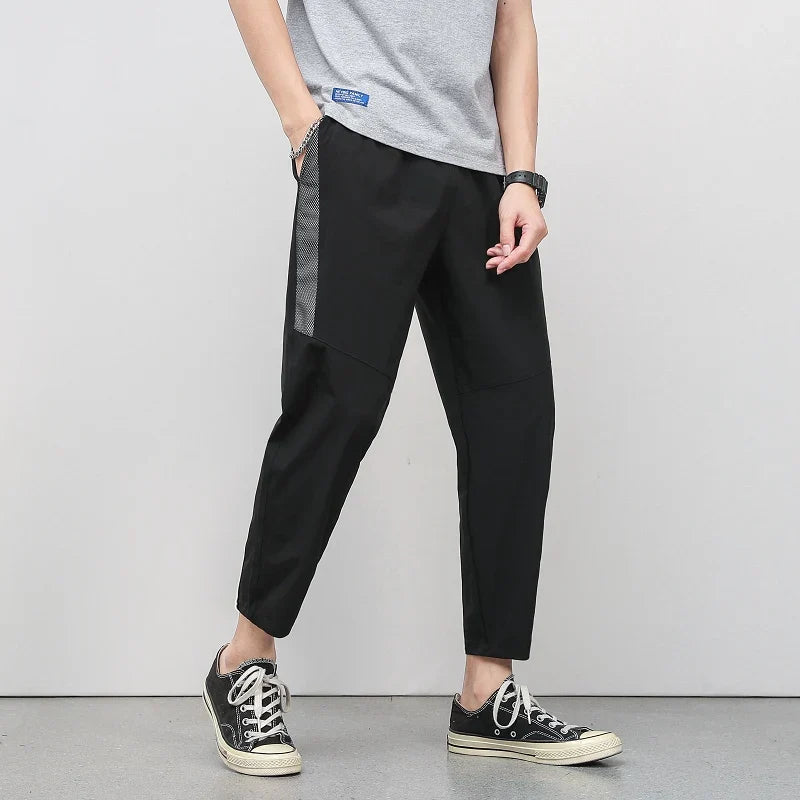 Pantalon Décontracté À Coupe Courte En Soie Glacée Avec Bande Latérale Et Jambe Fuselée Pour Style Polyvalent
