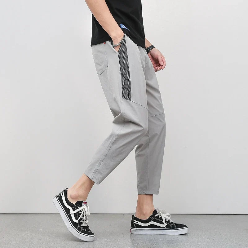 Pantalon Décontracté À Coupe Courte En Soie Glacée Avec Bande Latérale Et Jambe Fuselée Pour Style Polyvalent