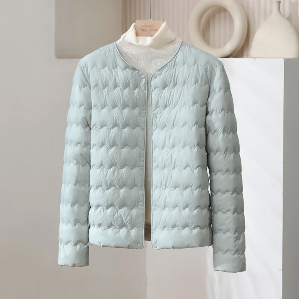 Doudoune Minimaliste Sans Col Matelassée En Duvet Avec Motif Ondulé Et Tissu Extérieur En Nylon Doux Résistant Au Vent