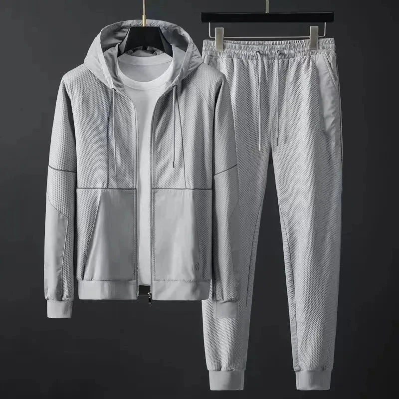 Survêtement Deux Pièces Léger À Texture Respirante Avec Veste Capuche Ajustable Et Pantalon Jogger Confortable
