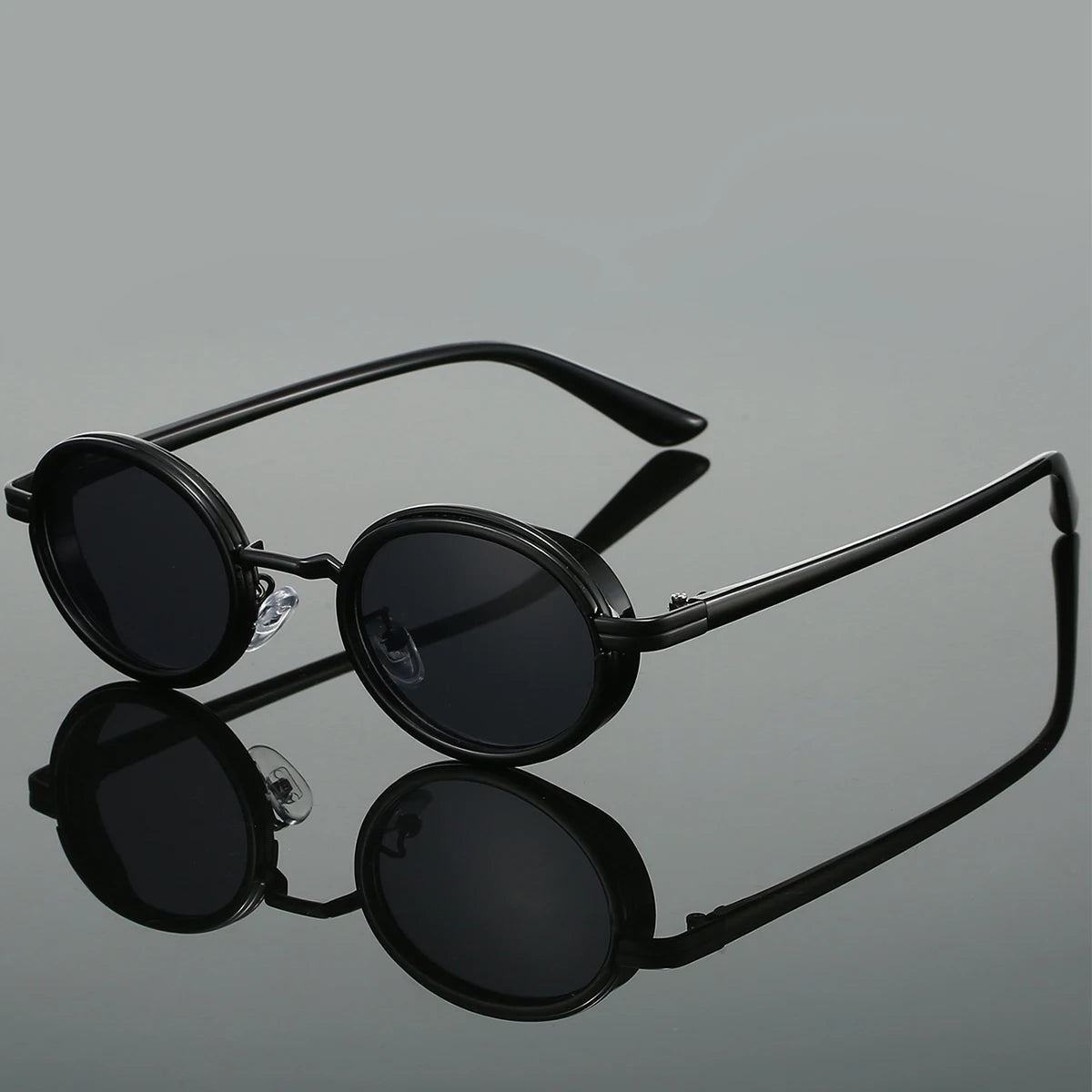 Lunettes de Soleil Loop Eclipse Noires Monture Métal Minimaliste Lentilles UV Protégeant