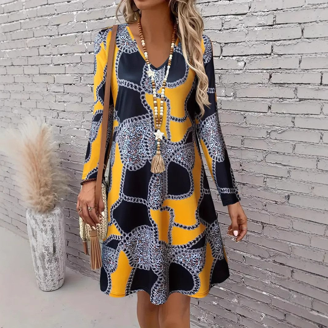 Fudus | Modernes, locker geschnittenes Langarm-V-Ausschnitt Kleid mit coolem Druck