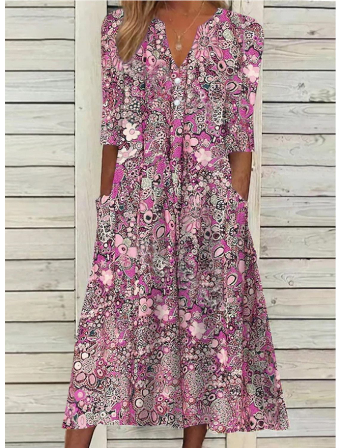 Damen-Midikleid mit Blumenmuster und aufgesetzten Taschen