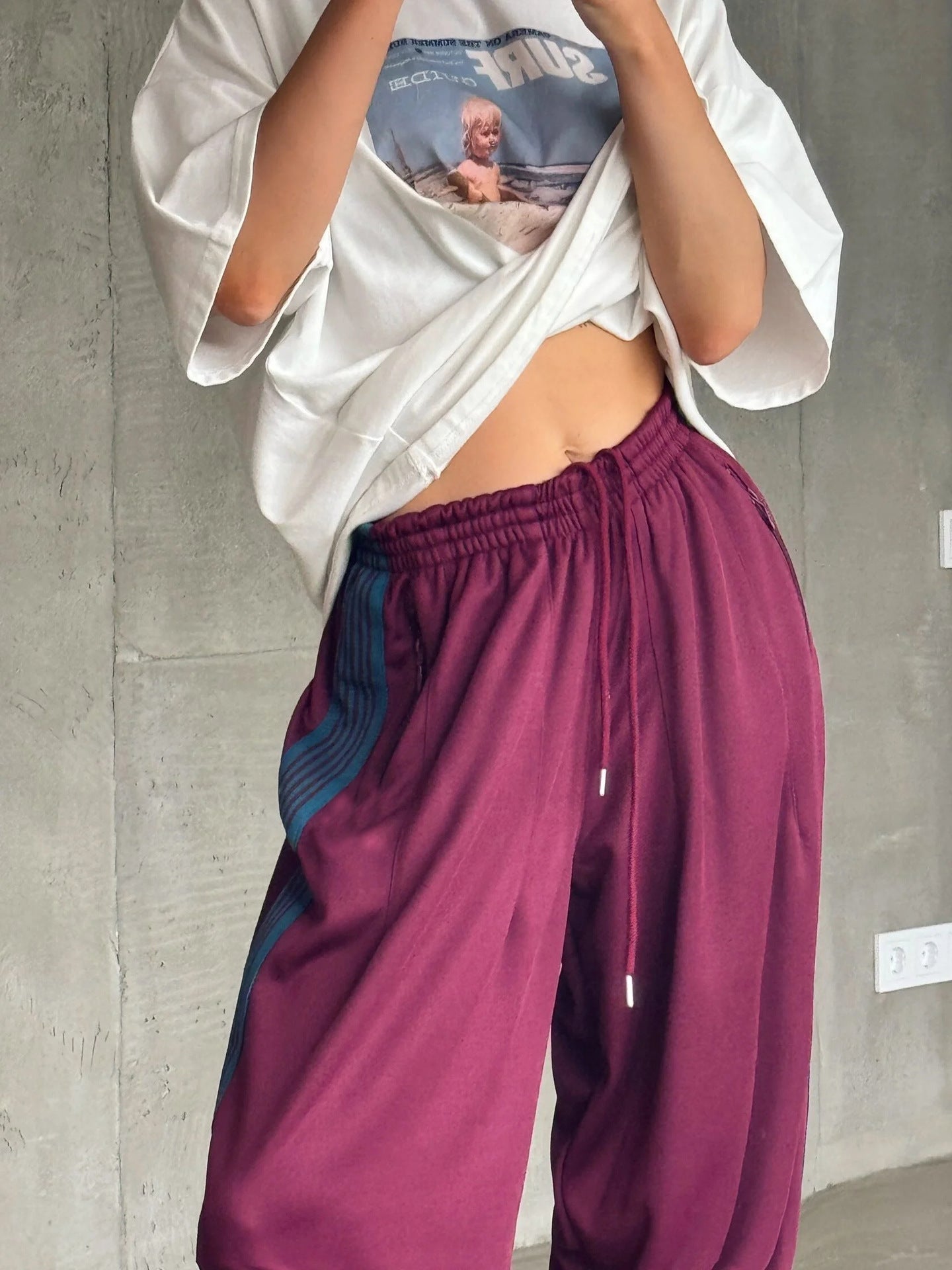 Damen weite Sporthose mit diagonalen Streifen Amawinc