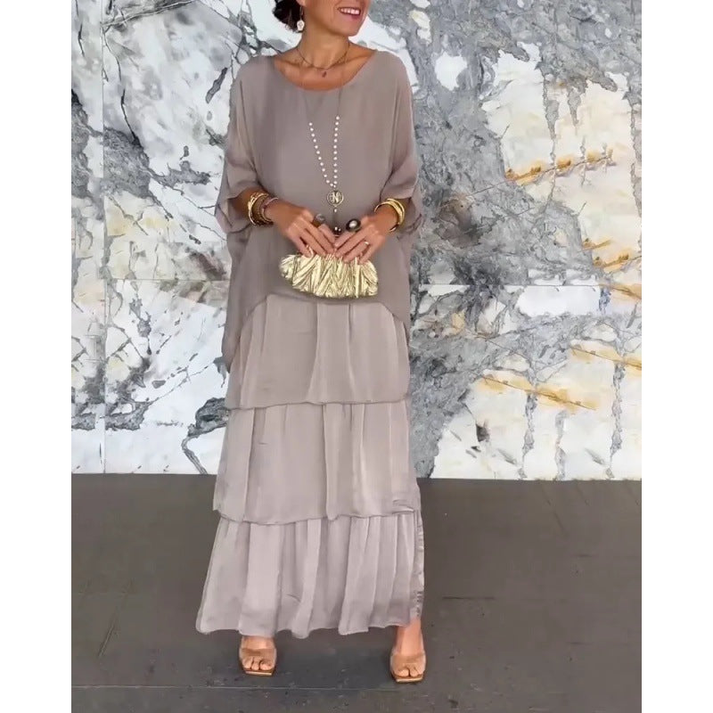 Elegantes langes Damenkleid mit Rundhalsausschnitt und Fledermausärmeln von Fudus