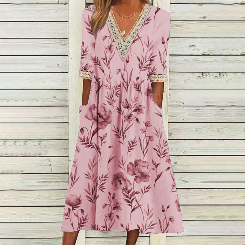 Elegantes Spitzenkleid mit V-Ausschnitt und Dreiviertelärmeln von Fudus