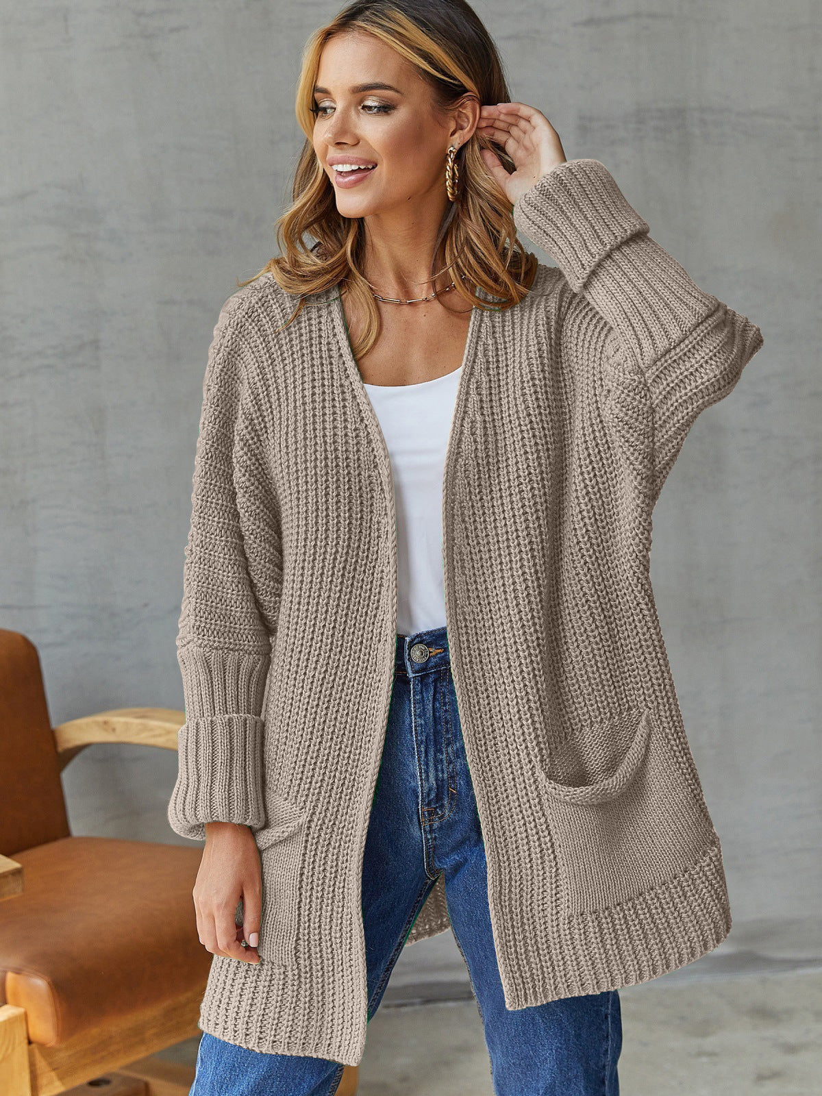 Damen gemütliche Strickjacke mit tiefen Taschen und volumetrischen Ärmeln Amawinc