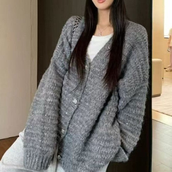 Damen Strickjacke mit voluminösen Ärmeln und einzigartiger Maschenstruktur Amawinc