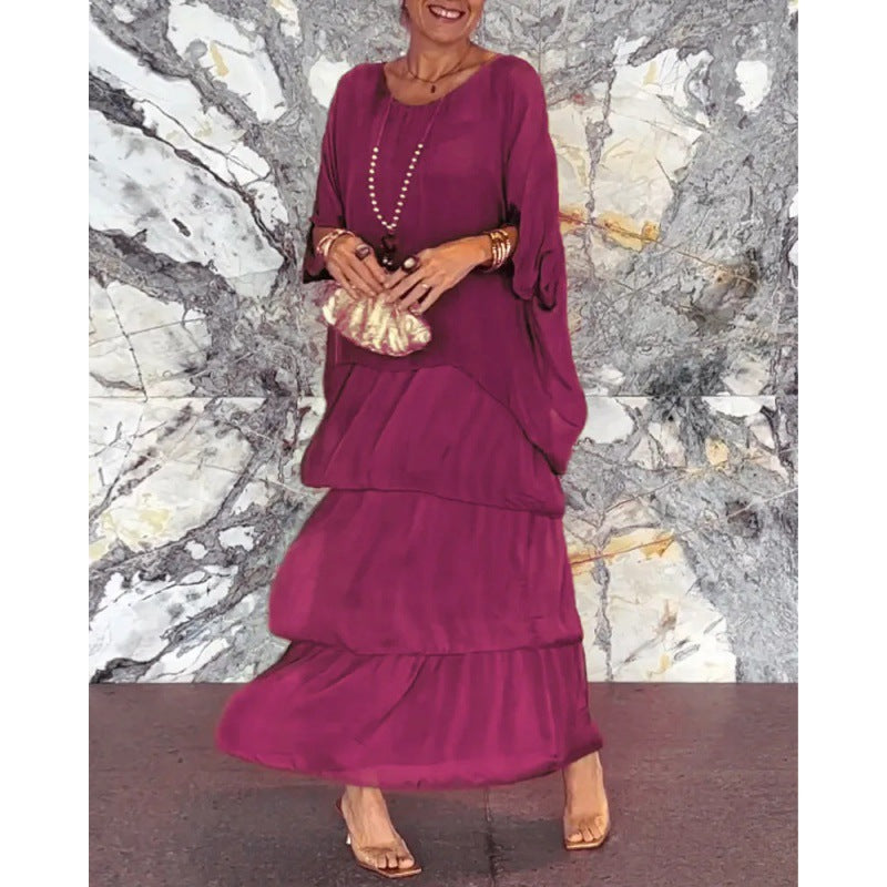 Elegantes langes Damenkleid mit Rundhalsausschnitt und Fledermausärmeln von Fudus