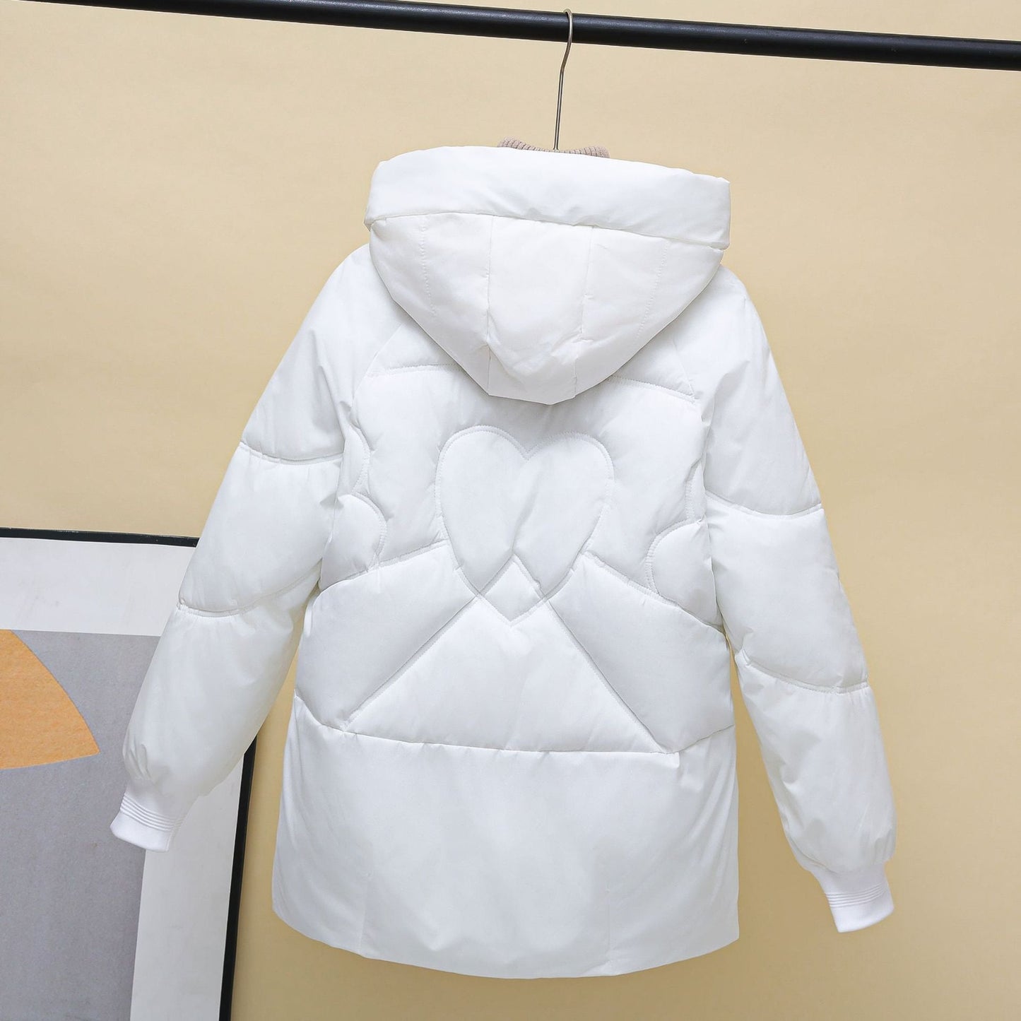 Damen gesteppte Winterjacke mit Kapuze und Herzdetails Amawinc