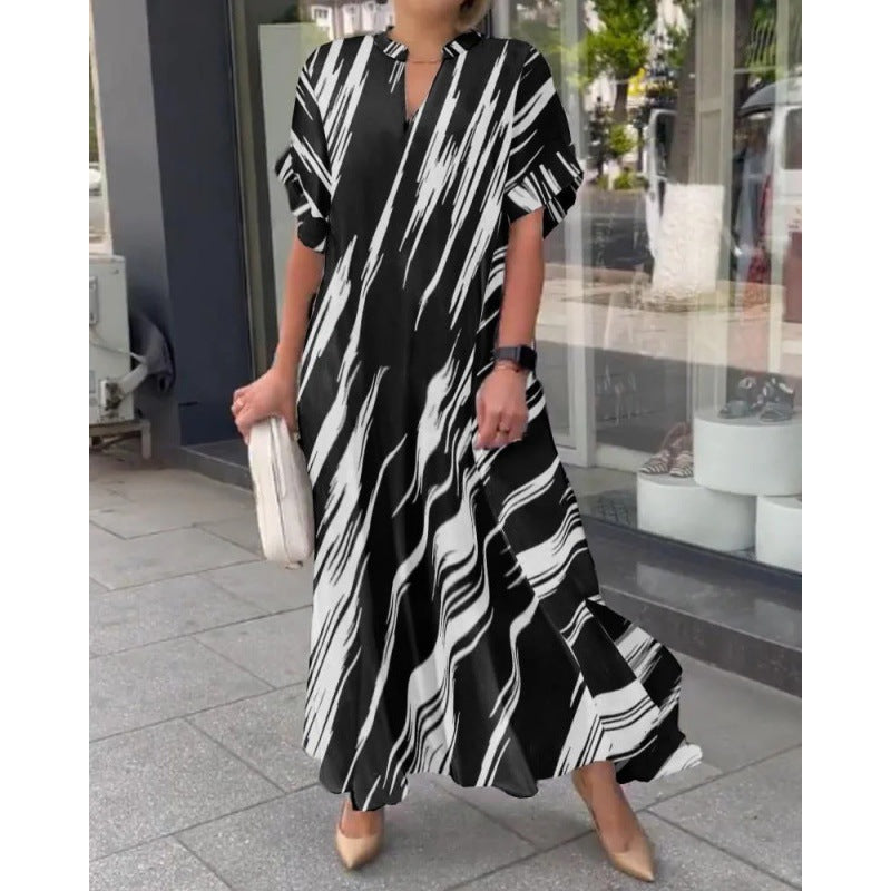 Modisches Maxi-Kleid mit Streifenmuster und hohem Schlitz von Fudus