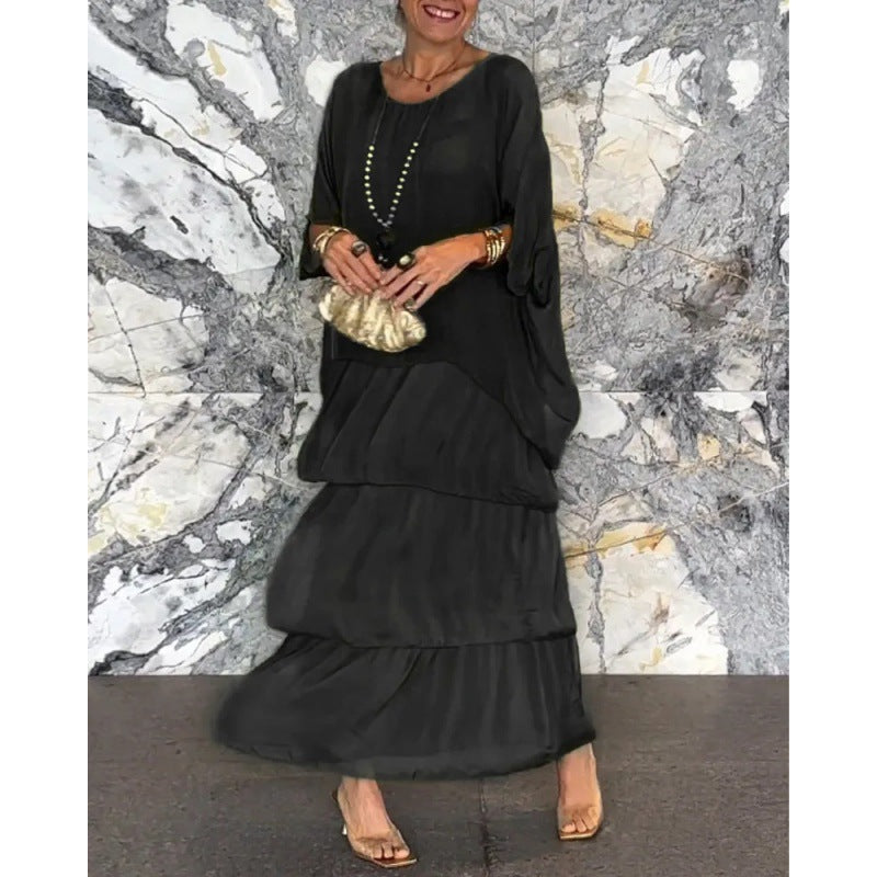 Elegantes langes Damenkleid mit Rundhalsausschnitt und Fledermausärmeln von Fudus