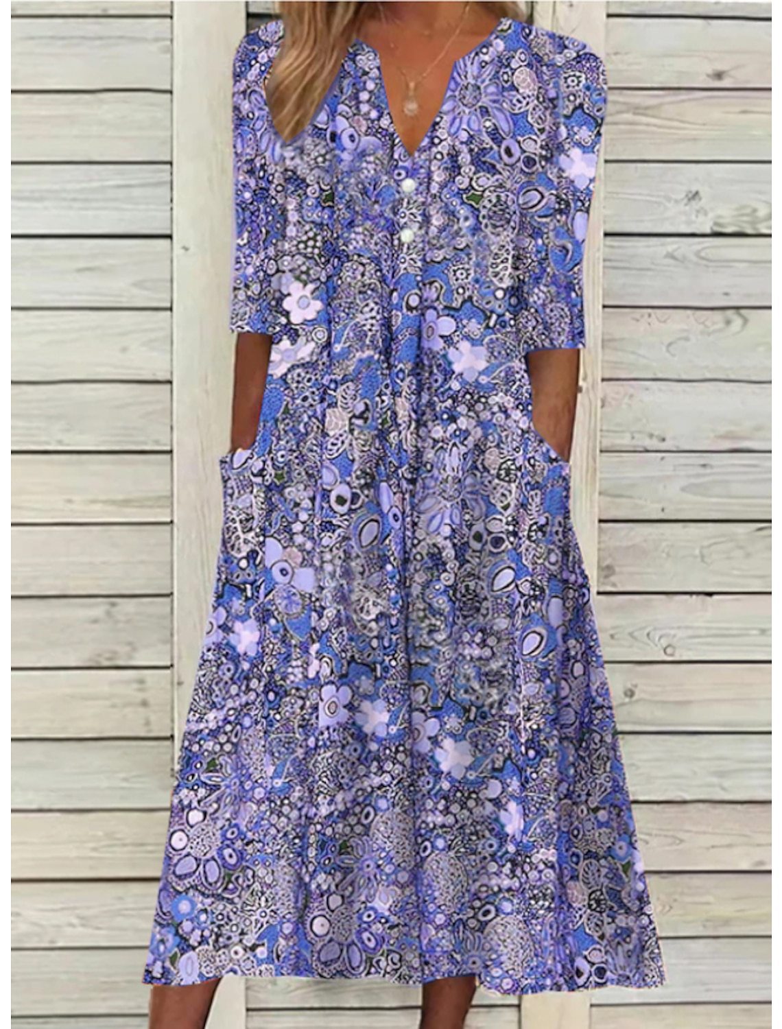 Damen-Midikleid mit Blumenmuster und aufgesetzten Taschen