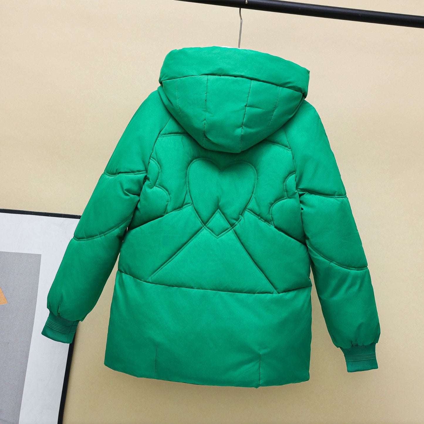 Damen gesteppte Winterjacke mit Kapuze und Herzdetails Amawinc