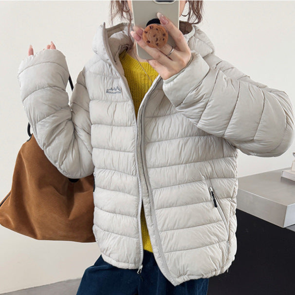 Damen ultraleichte Pufferjacke mit abnehmbarer Kapuze und elastischem Saum Amawinc