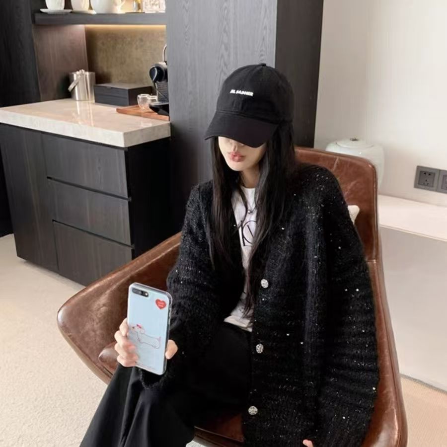 Damen Strickjacke mit voluminösen Ärmeln und einzigartiger Maschenstruktur Amawinc