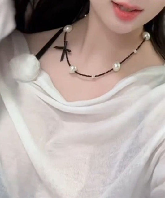 Collier original en acier inoxydable noir avec perles et nœud - Amawinc