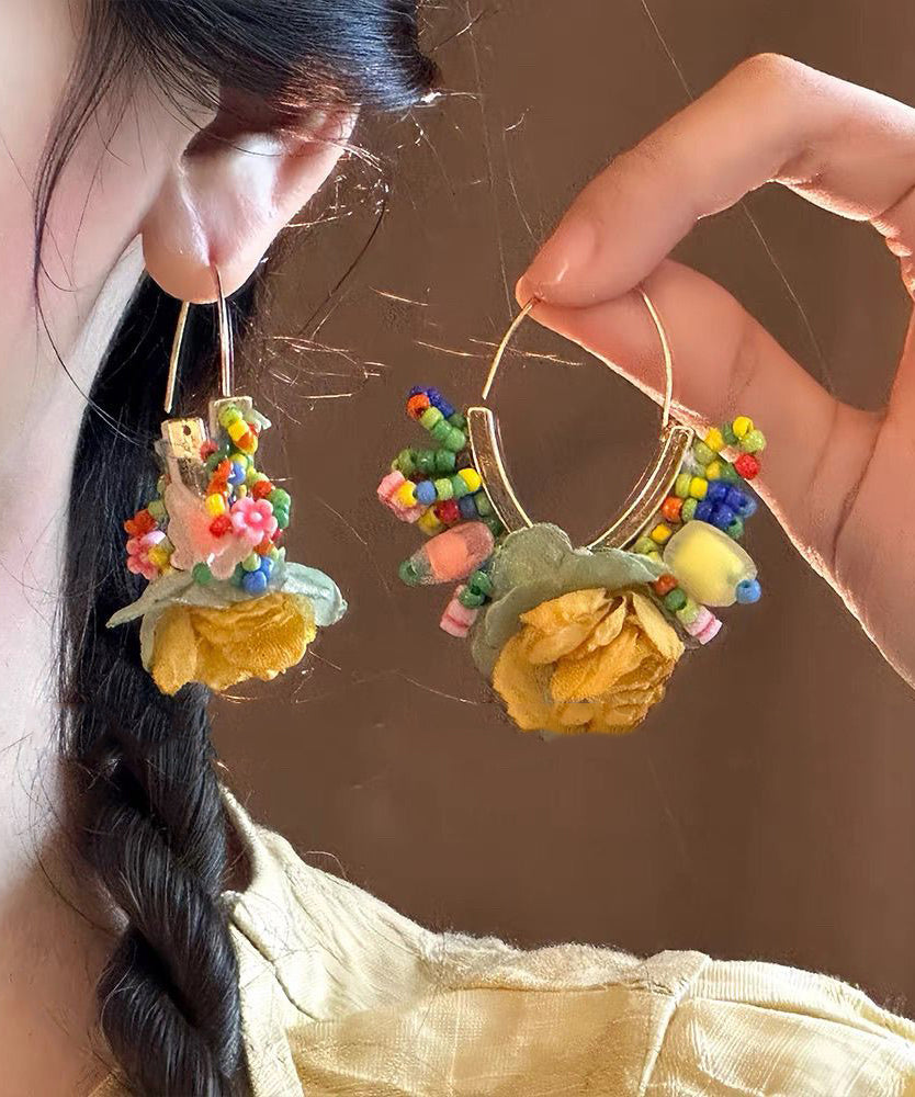 Boucles d'oreilles créoles florales en perles de tulle dorées et cuivrées au design original - Amawinc