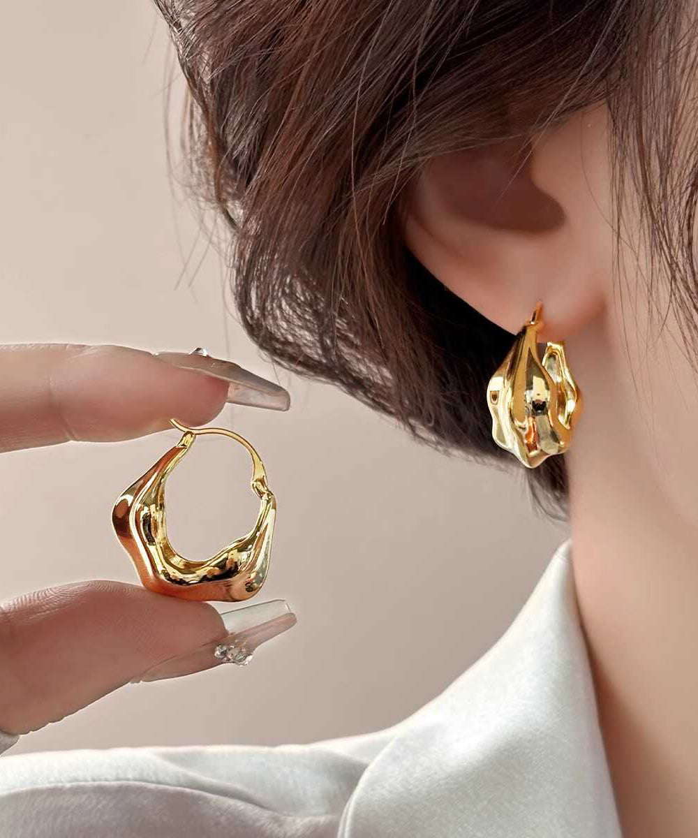 Boucles d'oreilles créoles en métal doré au design original - Amawinc