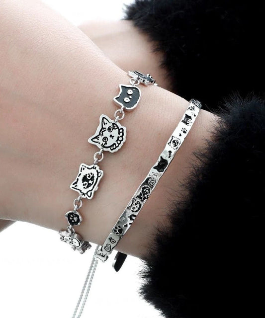 Ensemble de deux bracelets à breloques originaux en soie et cuivre avec graffitis et petits chats - Amawinc